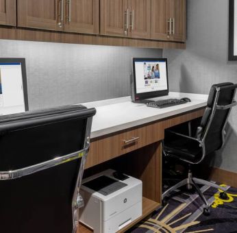 Business center with computers at Hampton Inn & Suites Los Angeles/ Hollywood.