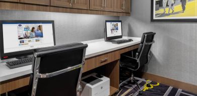 Business center with computers at Hampton Inn & Suites Los Angeles/ Hollywood.