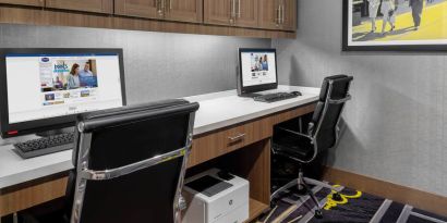 Business center with computers at Hampton Inn & Suites Los Angeles/ Hollywood.