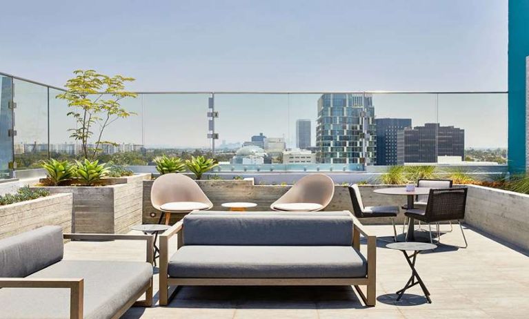 Rooftop with seating area at AC Hotel By Marriott Beverly Hills.