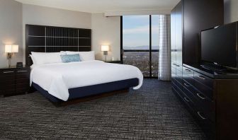 Bright and comfortable king bedroom at Embassy Suites By Hilton LAX Airport North.