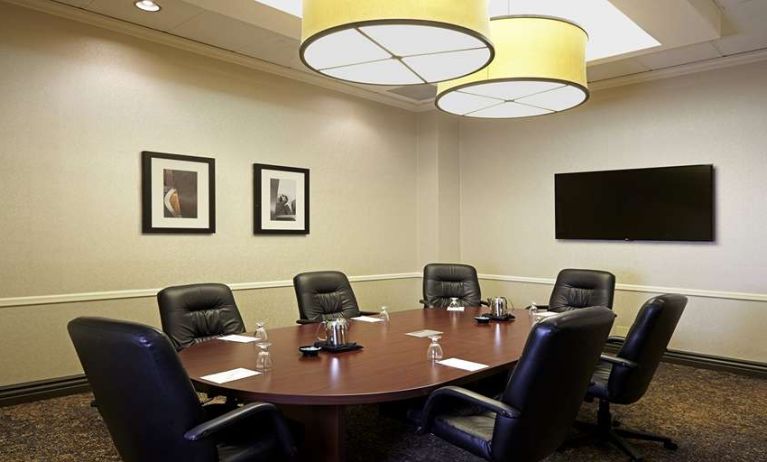 Meeting room wirh small table at Embassy Suites By Hilton LAX Airport North.