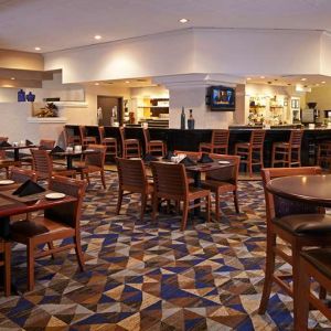 Dining area suitable for co-working at Embassy Suites By Hilton LAX Airport North.