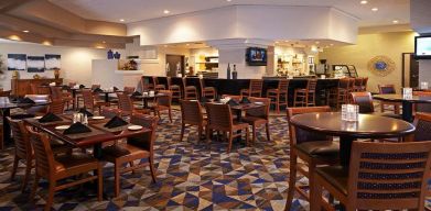 Dining area suitable for co-working at Embassy Suites By Hilton LAX Airport North.