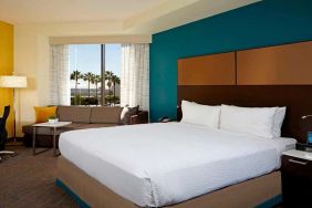 King bedroom with workstation at Residence Inn By Marriott LAX Airport.