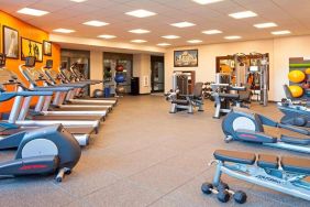 Fitness center with treadmills at Residence Inn By Marriott LAX Airport.