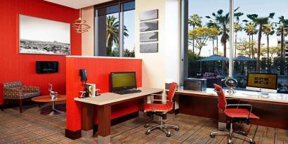 Business center with computers and printer at Residence Inn By Marriott LAX Airport.