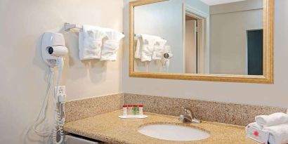 Guest bathroom at Ramada Los Angeles Downtown West.