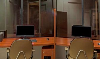 Business center with computers and printer at Ramada Los Angeles Downtown West.