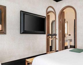 Hotel room with TV screen at the Hotel Montera Madrid, Curio Collection by Hilton.