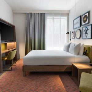 King bedroom with workstation at the Hampton by Hilton Istanbul Arnavutkoy.