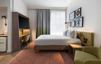 King bedroom with workstation at the Hampton by Hilton Istanbul Arnavutkoy.