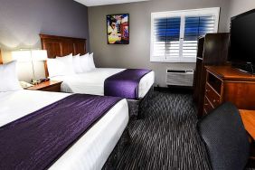 Hotel room with 2 queen beds at Best Western McCarran Inn.