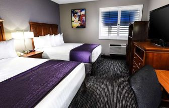 Hotel room with 2 queen beds at Best Western McCarran Inn.