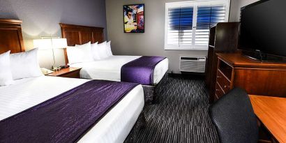 Hotel room with 2 queen beds at Best Western McCarran Inn.