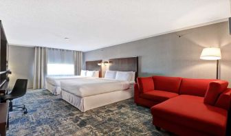 Twin room with L sofa at Four Points By Sheraton Toronto Mississauga.