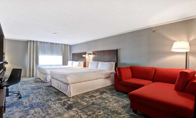 Twin room with L sofa at Four Points By Sheraton Toronto Mississauga.