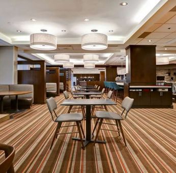 Seating area perfect as workspace at Four Points By Sheraton Toronto Mississauga.