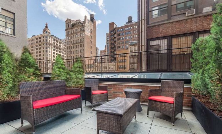 Outdoor terrace overlooking the city at The Paul Hotel, An Ascend Hotel Collection Member.