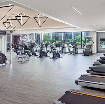 Fully equipped fitness center at Atlanta Marriott Northwest At Galleria.