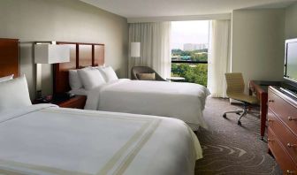 Twin room with desk and window at Atlanta Marriott Northwest At Galleria.