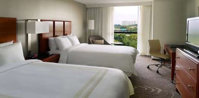 Twin room with desk and window at Atlanta Marriott Northwest At Galleria.