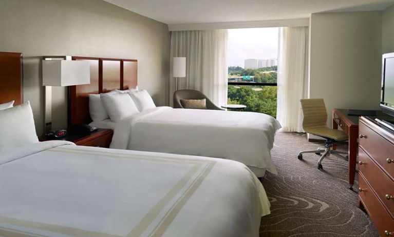 Twin room with desk and window at Atlanta Marriott Northwest At Galleria.