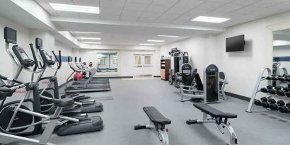 well equppied fitness center with weights and exercise equipment at Hampton Inn Philadelphia Center City-Convention Center.