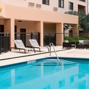 Refreshing outdoor pool at Courtyard Miami Dolphin Mall.