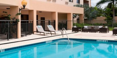 Refreshing outdoor pool at Courtyard Miami Dolphin Mall.