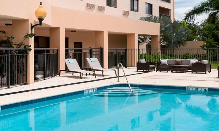 Refreshing outdoor pool at Courtyard Miami Dolphin Mall.