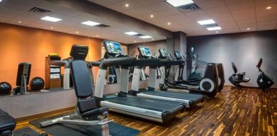 Well equipped fitness center at Courtyard By Marriott New York JFK Airport.