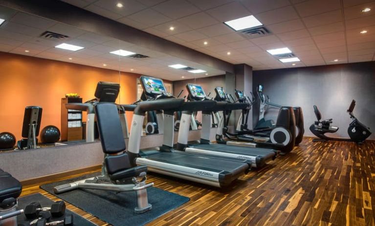 Well equipped fitness center at Courtyard By Marriott New York JFK Airport.