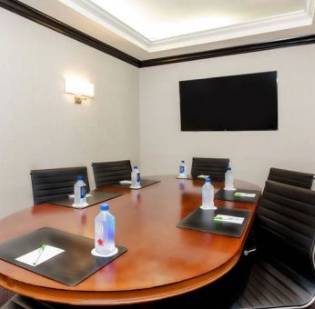 Fully equipped board room ideal for all business meetings at Courtyard By Marriott New York JFK Airport.