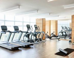 Fully equipped fitness center at AC Hotel by Marriott Miami Aventura.