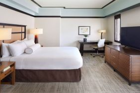 Spacious delux king room with TV and business desk at The Ambrose Hotel Santa Monica.