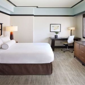 Spacious delux king room with TV and business desk at The Ambrose Hotel Santa Monica.