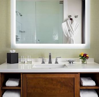 Guest bathroom with shower at The Ambrose Hotel Santa Monica.