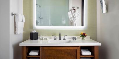 Guest bathroom with shower at The Ambrose Hotel Santa Monica.