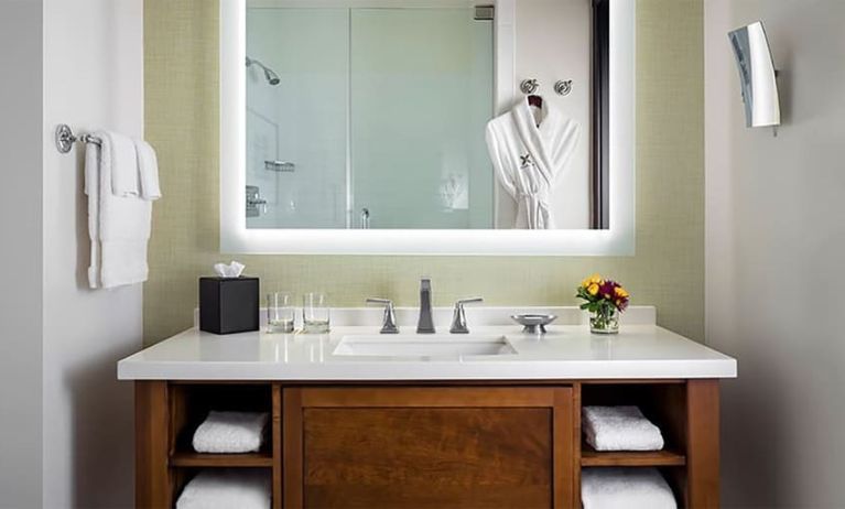 Guest bathroom with shower at The Ambrose Hotel Santa Monica.