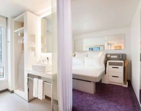 Dayroom with private guest bathroom at Yotel Boston.