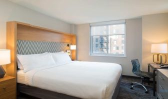 Lovely king bedroom with business desk at Holiday Inn Wall Street.