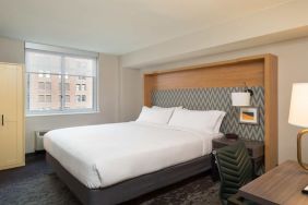 Comfortable delux king room with work station at Holiday Inn Wall Street.