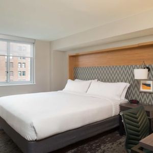 Comfortable delux king room with work station at Holiday Inn Wall Street.