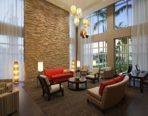 Comfortable lobby and coworking space at Cambria Hotel Miami Airport - Blue Lagoon.
