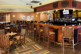 The hotel’s lounge bar, with tall bar chairs (and smaller tables and chairs).