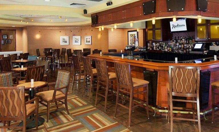 The hotel’s lounge bar, with tall bar chairs (and smaller tables and chairs).