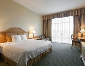 Lovely king suite with business desk at Monumental Hotel Orlando.