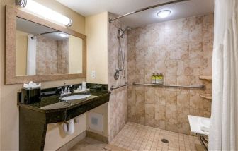 Private guest bathroom with shower at Holiday Inn Resort Lake Buena Vista.