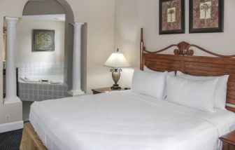 Lovely king bedroom with private bathroom at Grande Villas Resort.